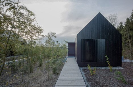 Blackened Timber Cottages by Format Elf Architekten 5